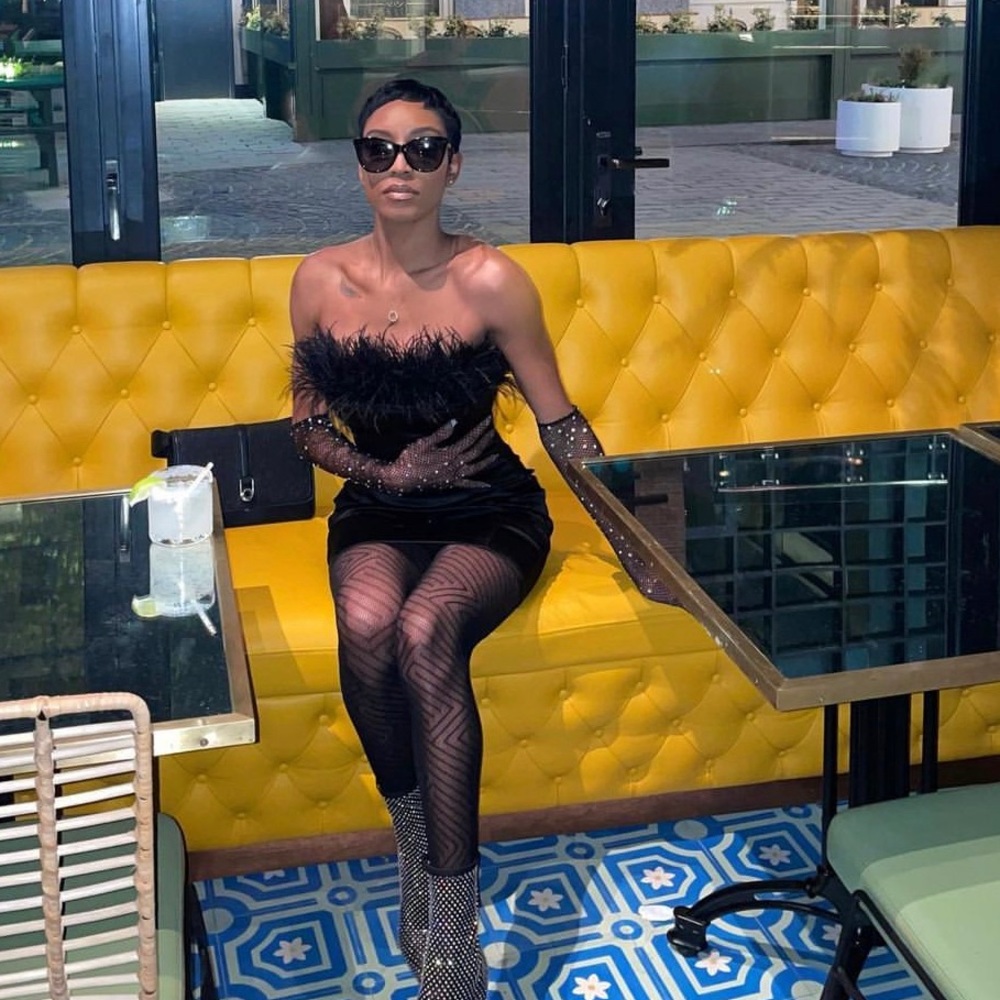 Black Satin Off Shoulder Feather Mini Dress.